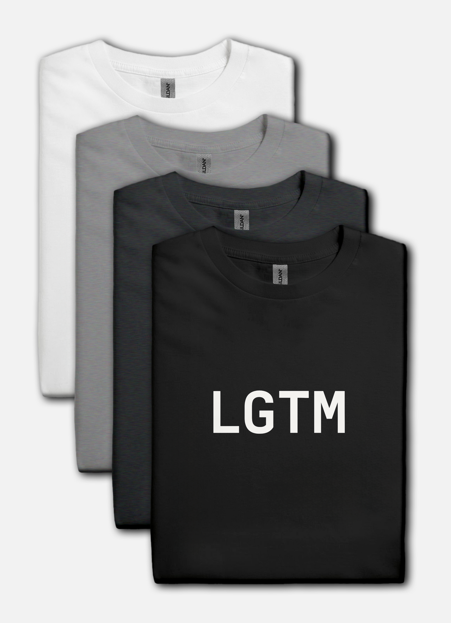 Four folded t-shirts in black, gray, and white with 'LGTM' text on a white background