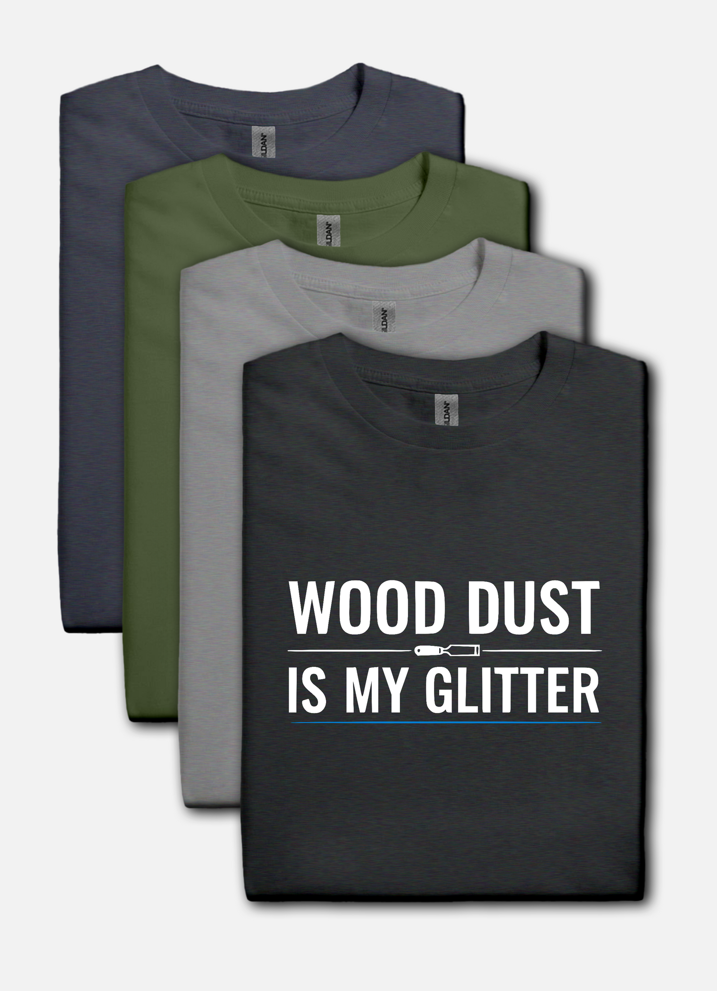 Dark heather t-shirt with bold white text that reads “Wood Dust Is My Glitter,” minimal graphic design.