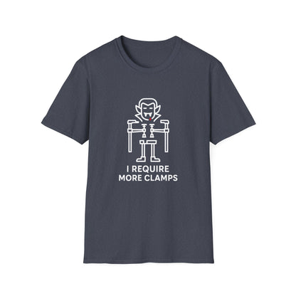 Flat lay of Clampire Halloween T-shirt. White clamp vampire graphic with text ‘I Require More Clamps’ on soft navy cotton tee.