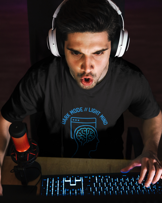 Cyberpunk hacker graphic tee featuring glowing brain outline and terminal window design in blue and graphite ink
