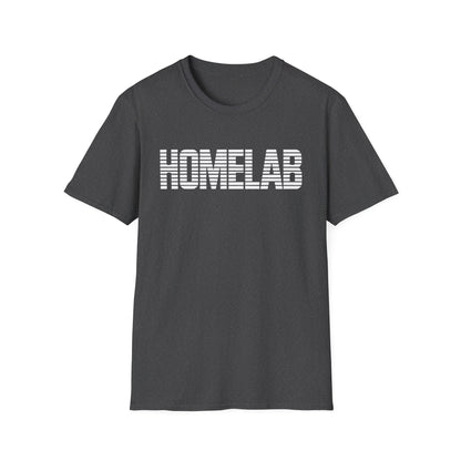 Dark Heather t-shirt laid flat featuring a bold white “HOMELAB” wordmark with horizontal stripe/scanline effect; retro computer aesthetic with soft natural shadows.