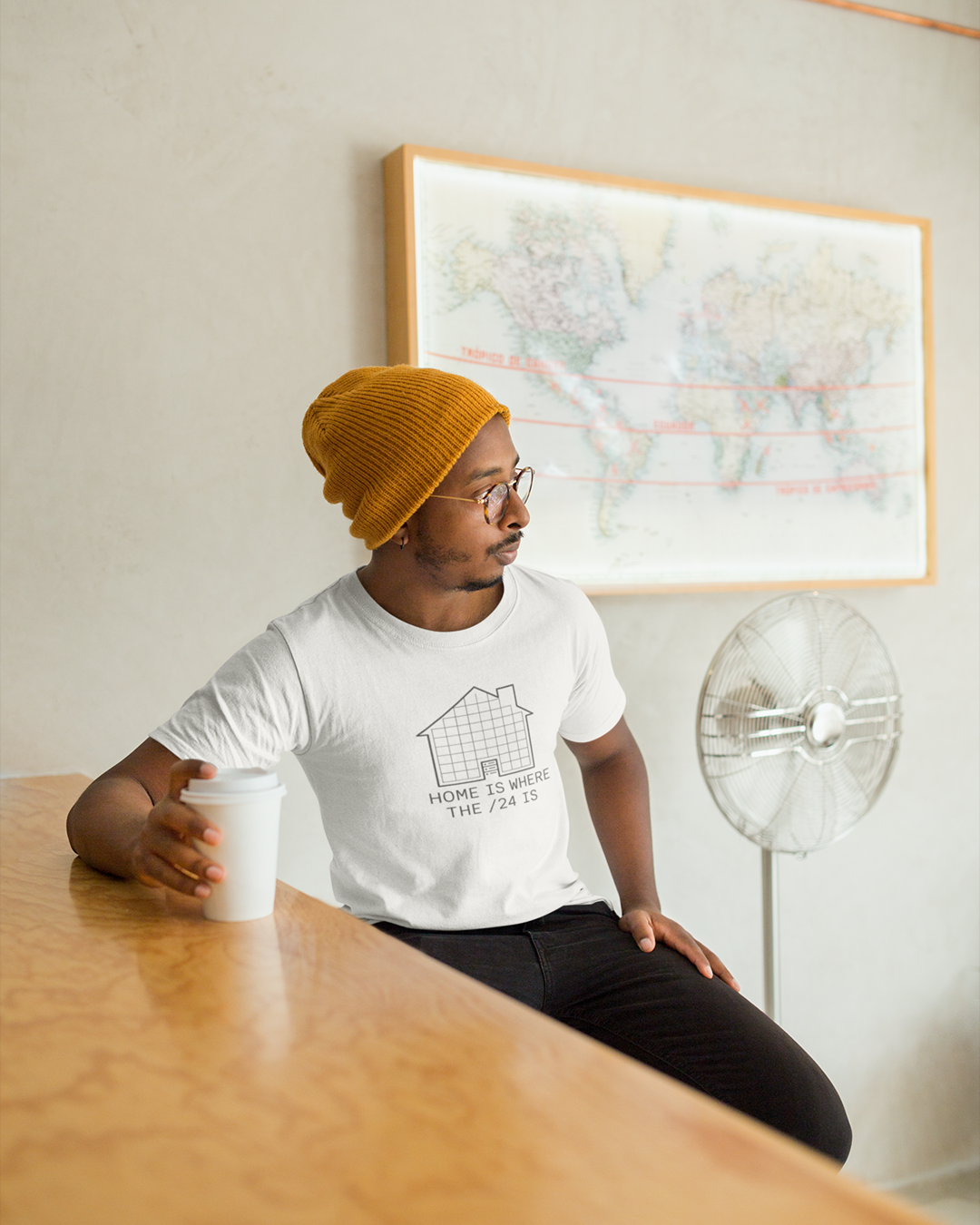 Minimalist t-shirt design with house outline and subnet grid, slogan “Home is Where the /24 Is” in monospaced font