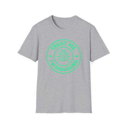 Gray t-shirt with green 'Trust Me, I'm Debugging' graphic on a white background